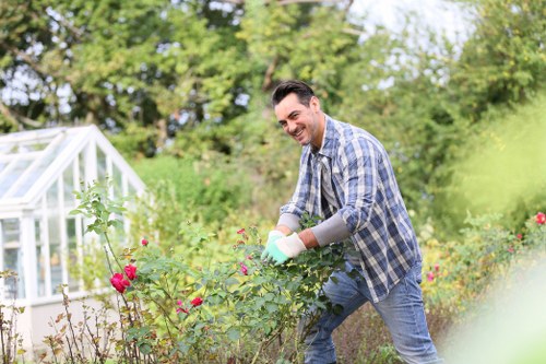 Professional turf laying process in a local rear garden